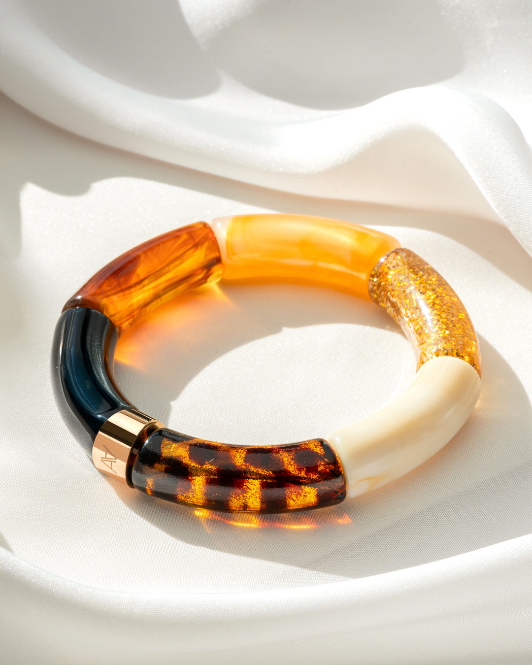 Packshot Bracelet Lueurs d'automne Noir, ambre, pailettes, beige créme et léopard Cerreto