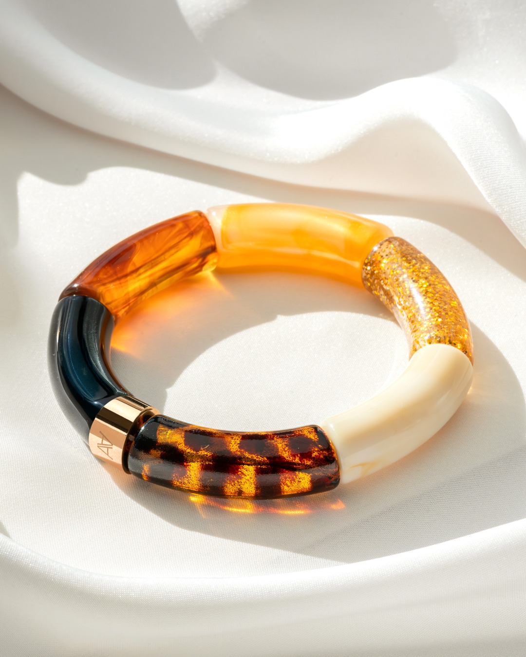 Packshot Bracelet Lueurs d'automne Noir, ambre, pailettes, beige créme et léopard Cerreto